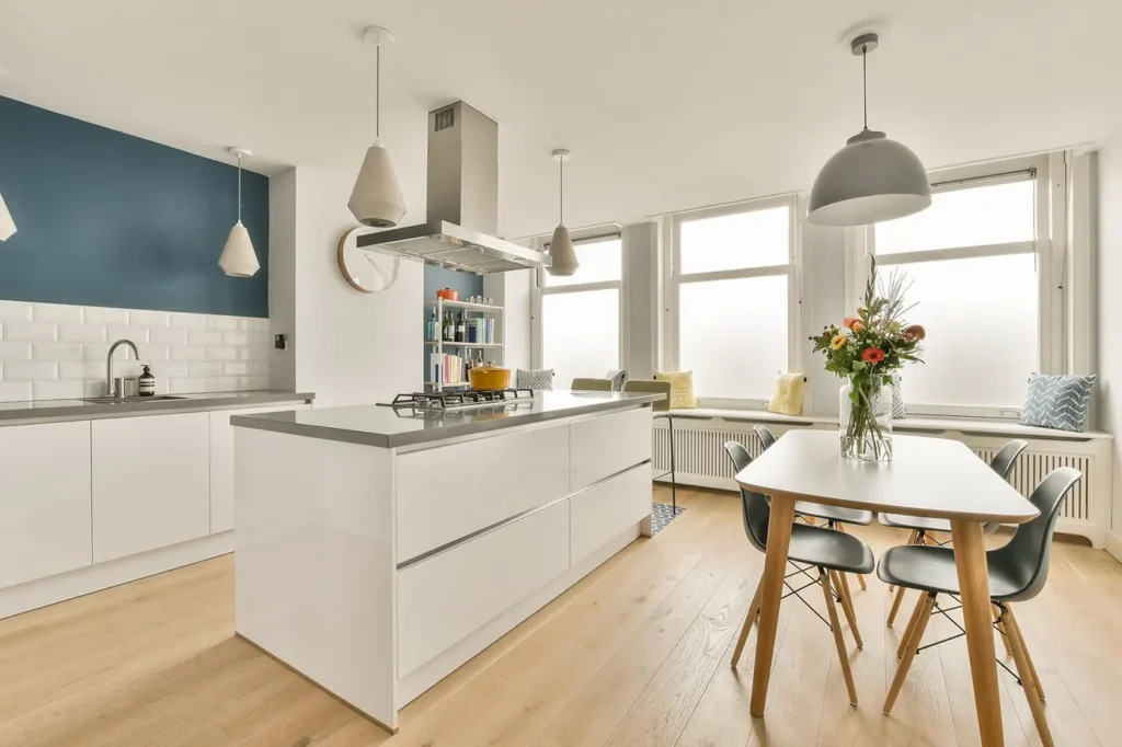 Spacious remodeled open-concept room with kitchen, dining, and living areas